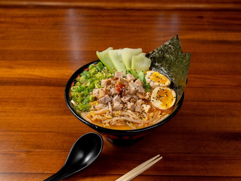 Bakudan Ramen Spicy Umami Miso bowl with diced pork chashu, bok choy, egg, and nori